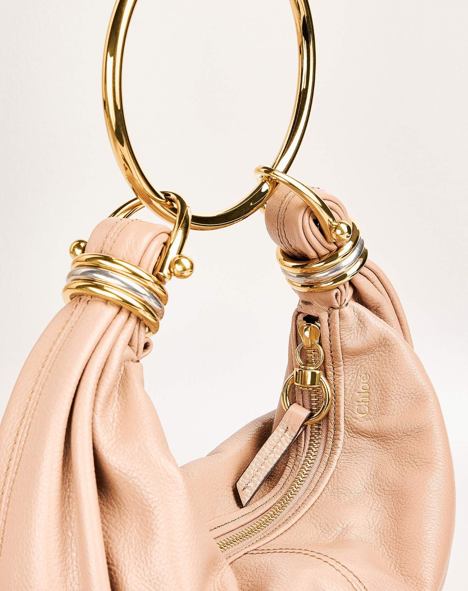Chloé bracelet bag in pink and gold
