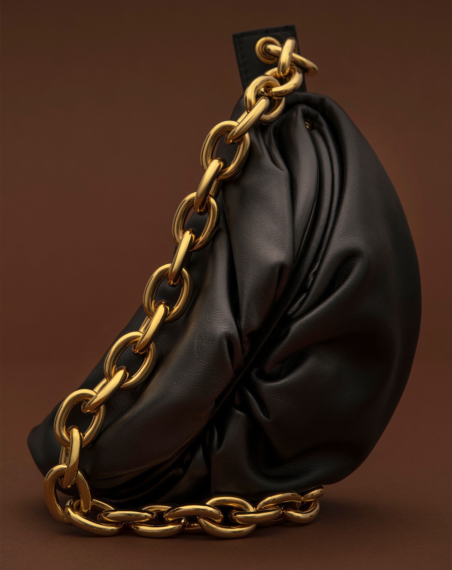The Pouch Bottega Veneta black leather handbag with chain